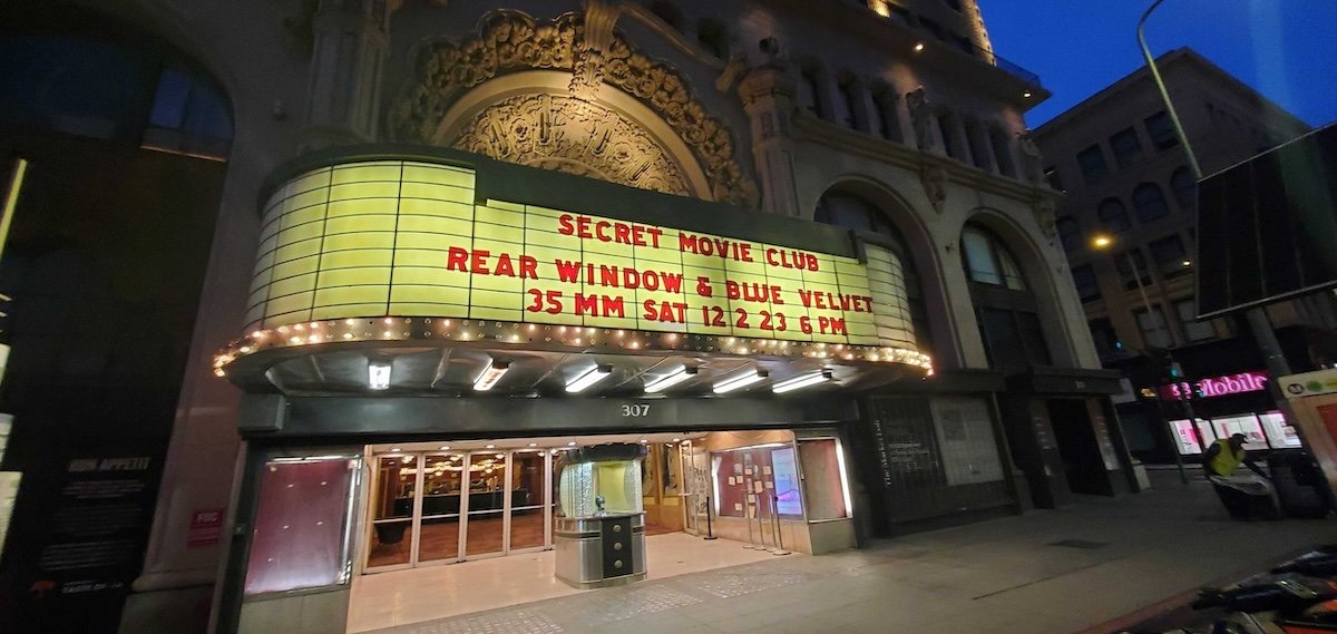 Secret Movie Club event marquee at the Los Angeles Theatre showing Rear Window and Blue Velvet on 35mm screening