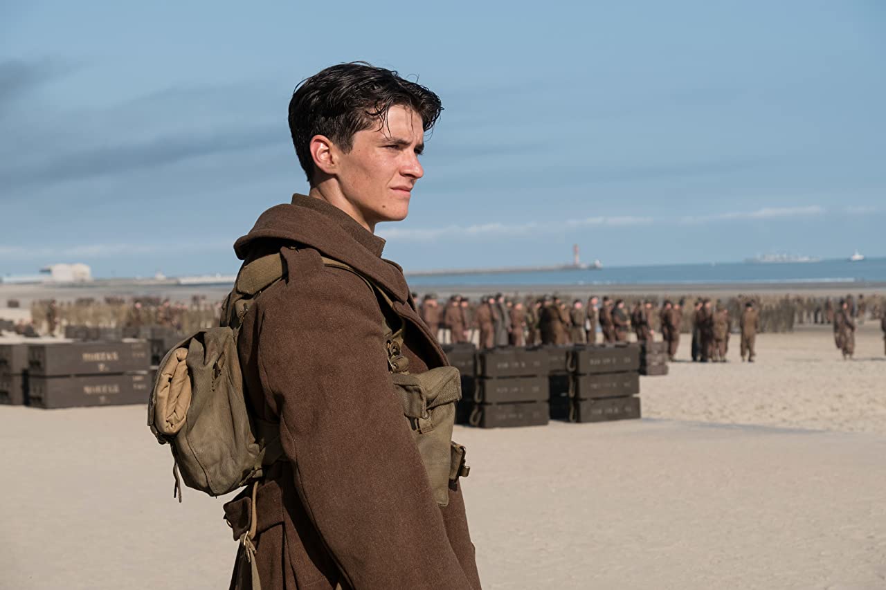 Film still showing a seaside scene from Dunkirk