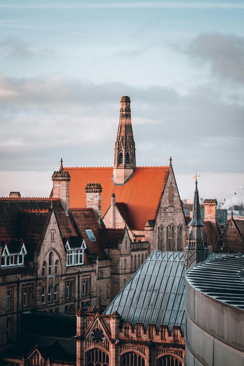 the sky and roofs of Manchester University and Oxford Rood Corridor
