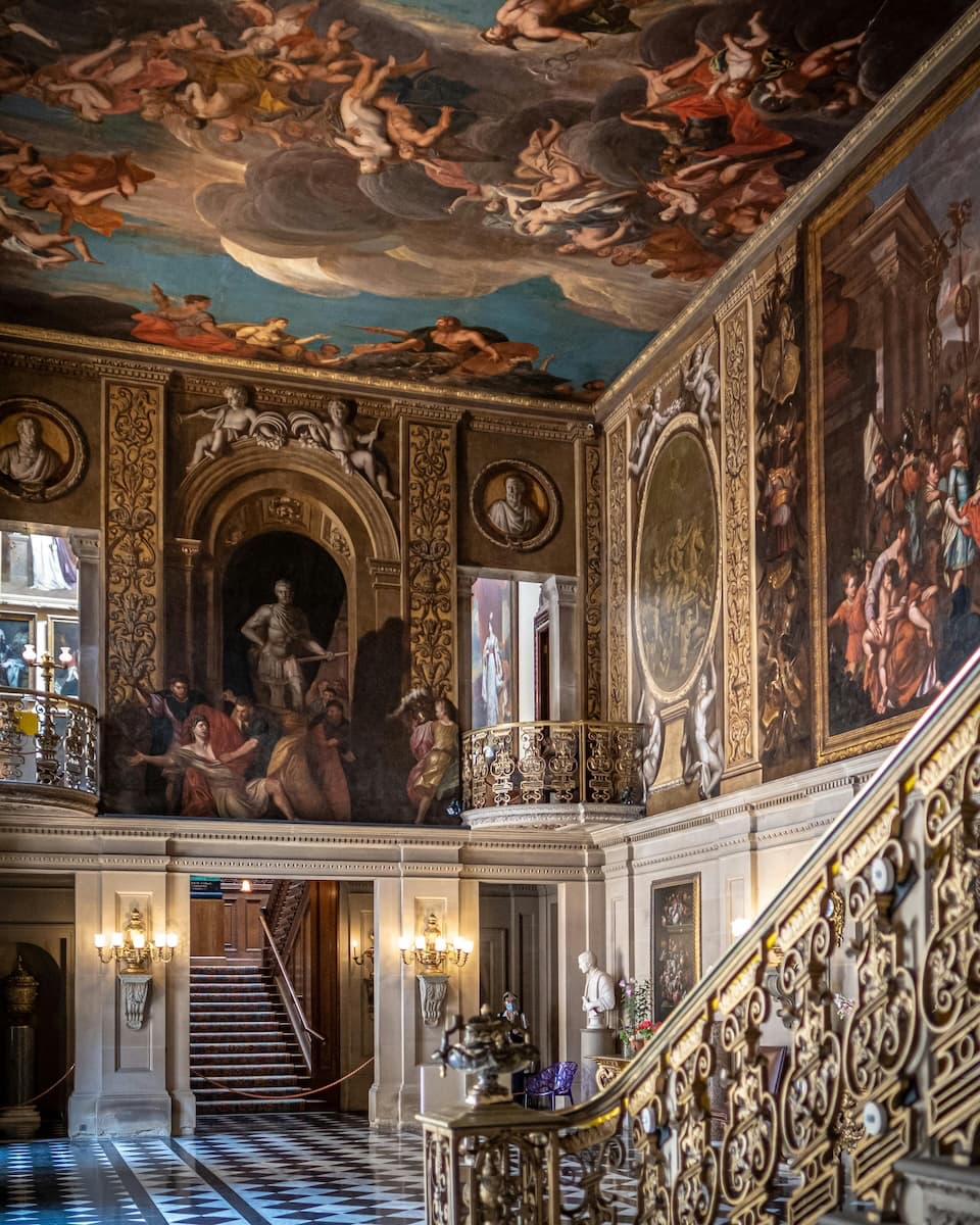 Grand baroque staircase and painted ceiling at Chatsworth House, a Pride and Prejudice filming location in Derbyshire
