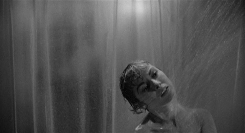 Film still from Psycho (1960) showing woman in the shower, by British director Alfred Hitchcock